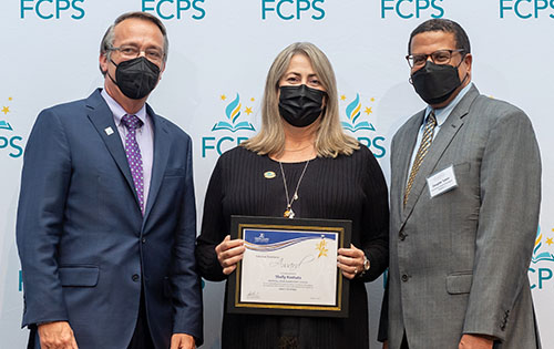 Shelly Koshuta with her FCPS Excellence Awards certificate